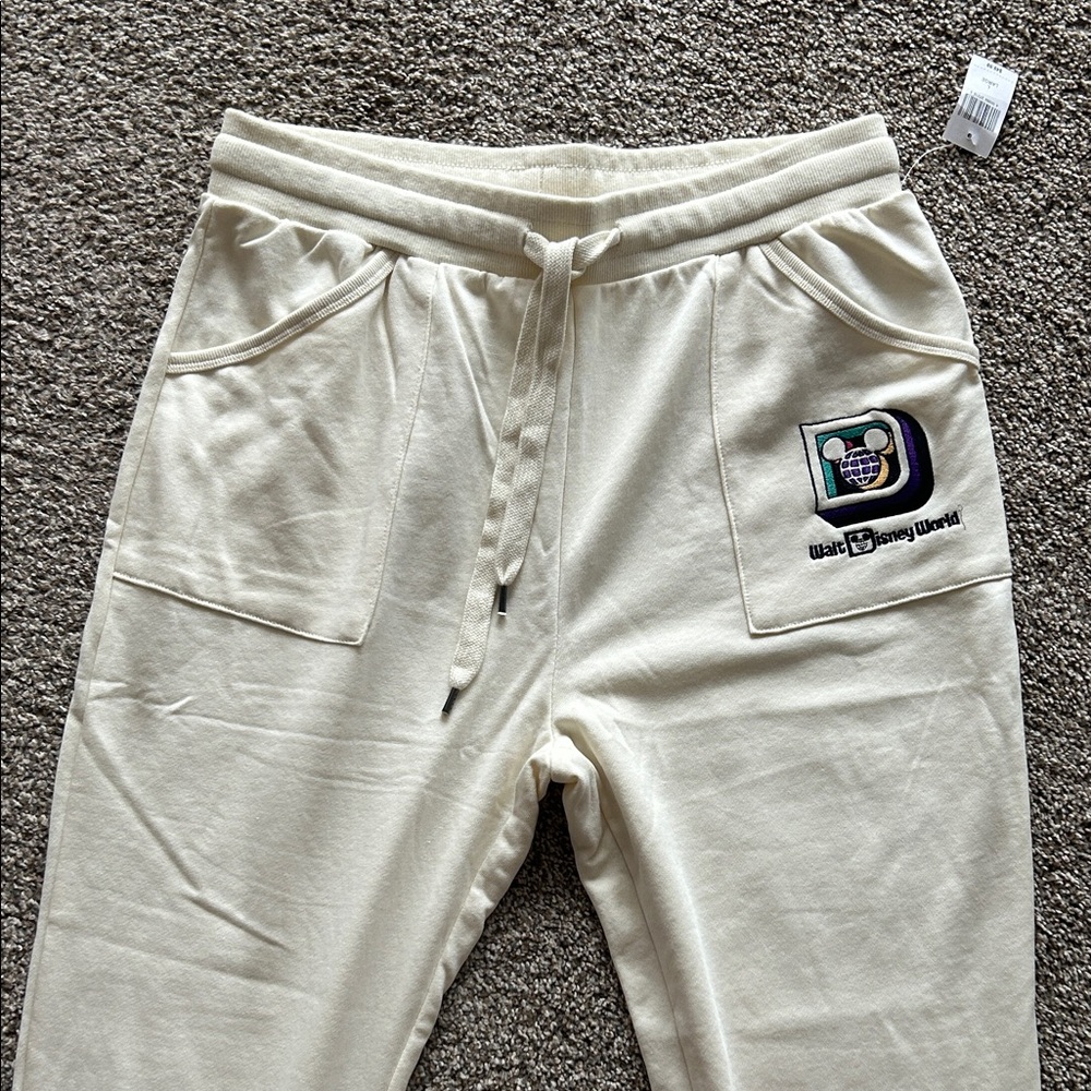 Disney Off-White Joggers with Logo Patch